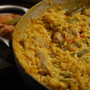 Paella valenciana de pollo y cerdo